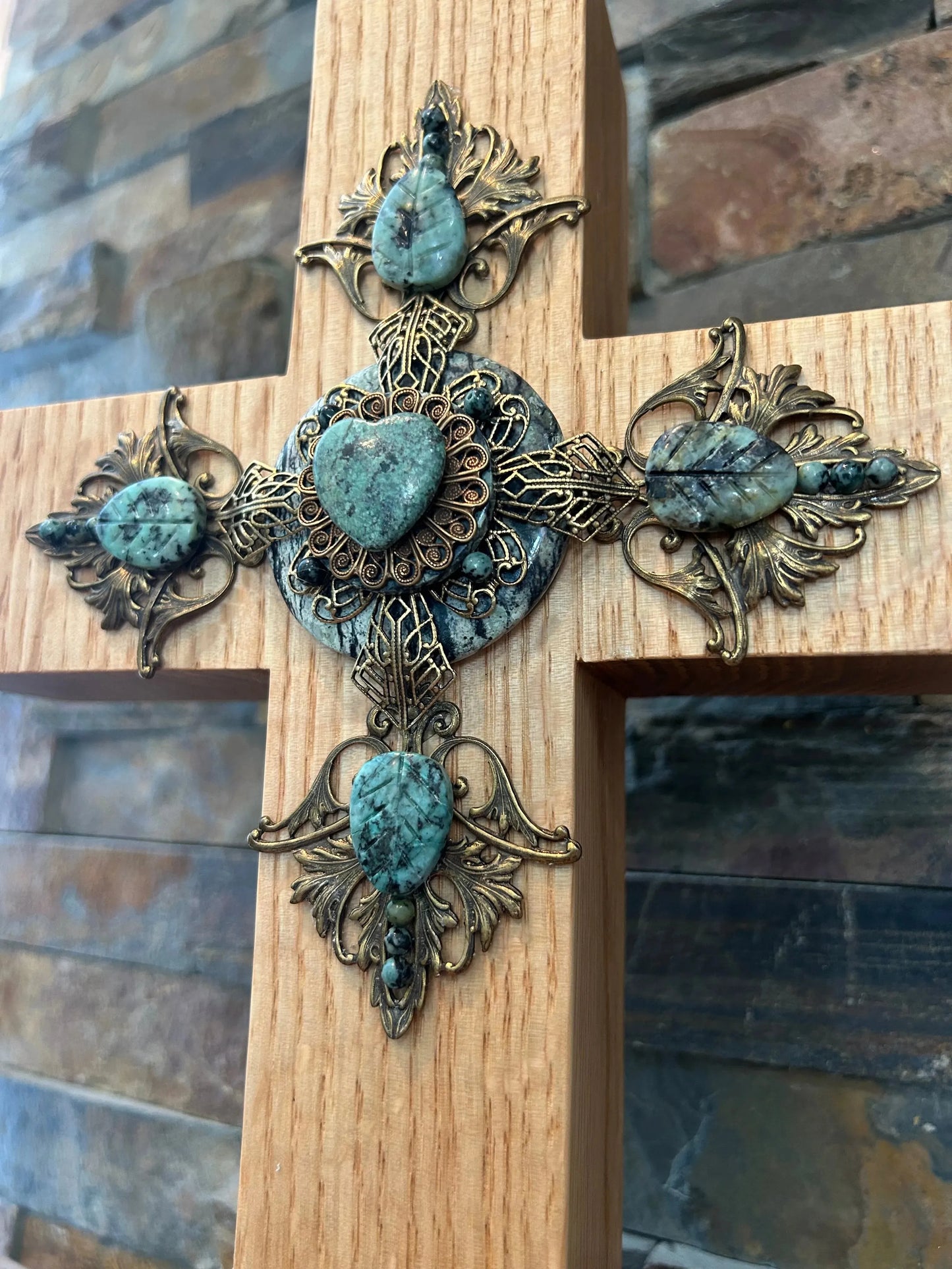 Dacole Designs handcrafted jeweled cross with turquoise stones and intricate metal details on wooden wall cross