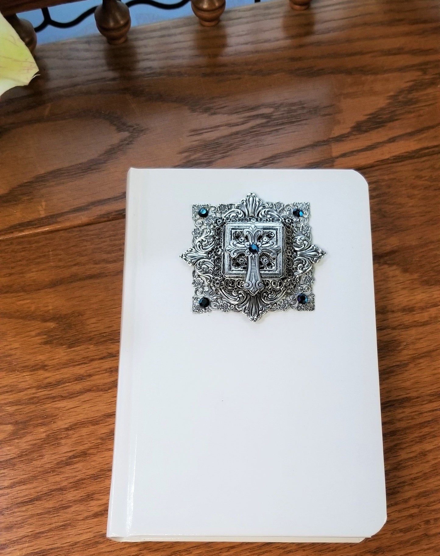 Dacole Designs compact size KJV jeweled baby Bible keepsake with ornate silver and blue jeweled cross on white cover