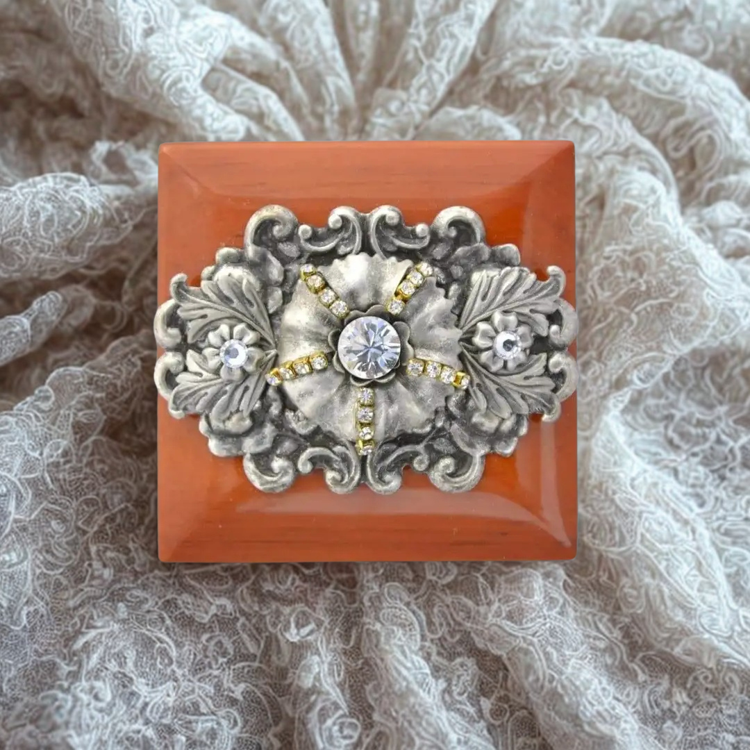 DeMartineau handcrafted wood ring box with ornate silver and crystal embellishment on lace background