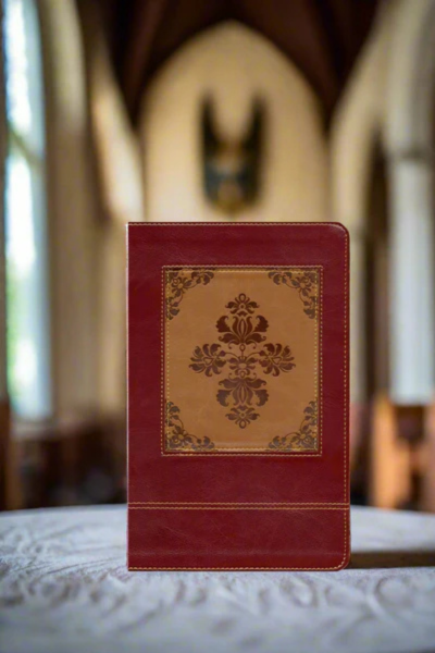 DeMartineau heritage edition KJV study Bible with brown and red leather cover on a church altar