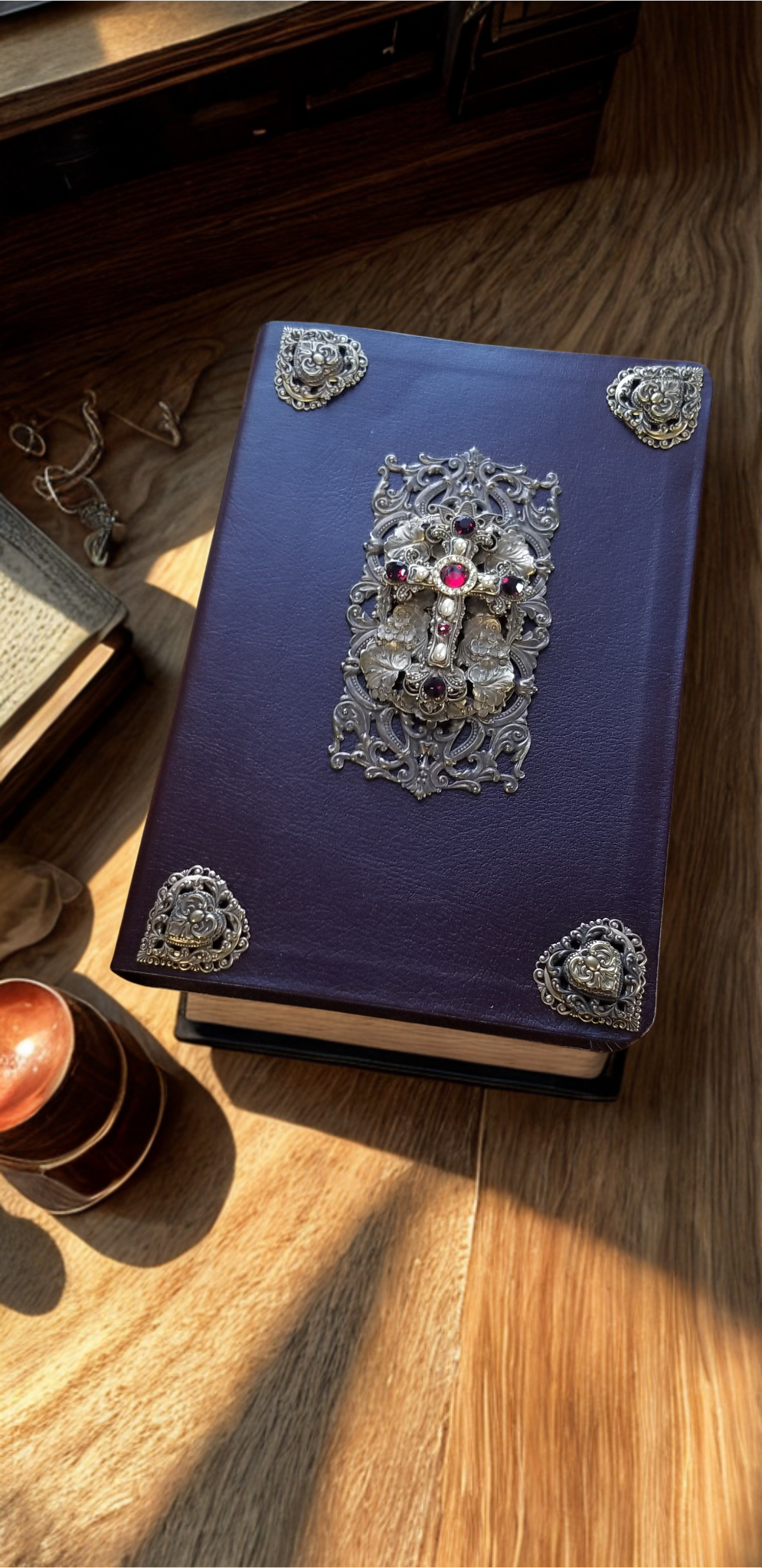 Dacole Designs personal size jeweled Bible with brass accents in purple cover on wooden table