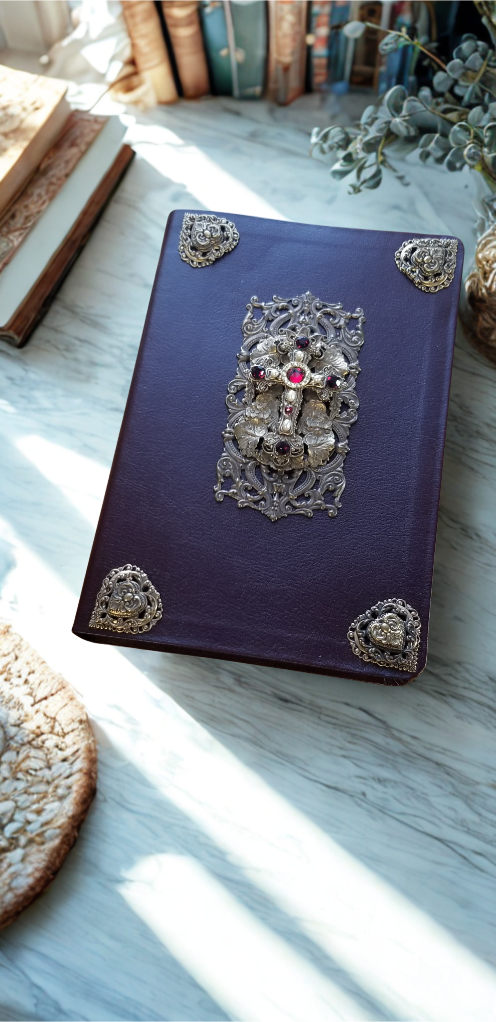 Personal size jeweled Bible with brass accents by Dacole Designs on marble surface