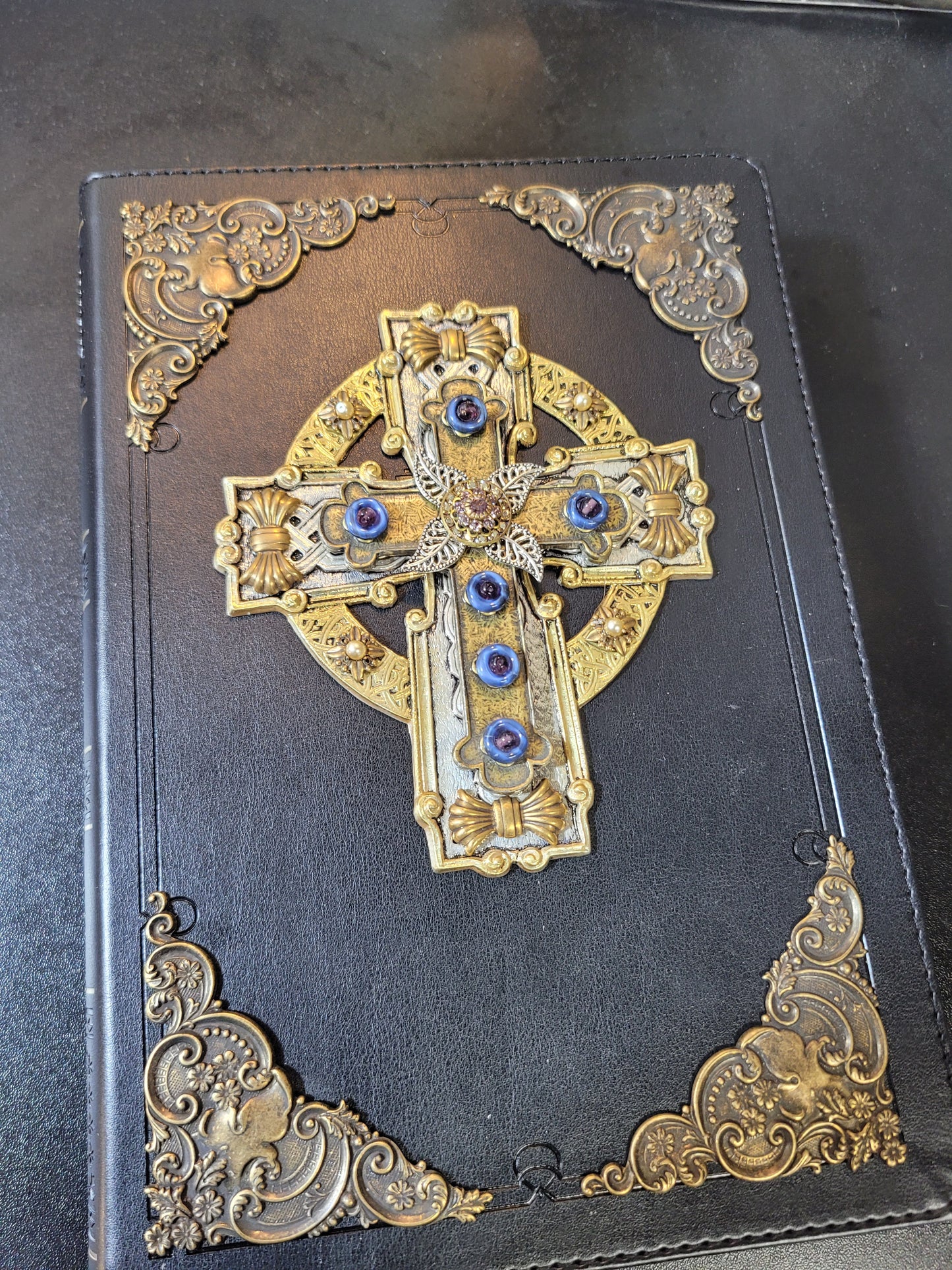 Jo Marz Personal Size jeweled celtic cross bible with ornate gold corners and blue gemstone embellishments