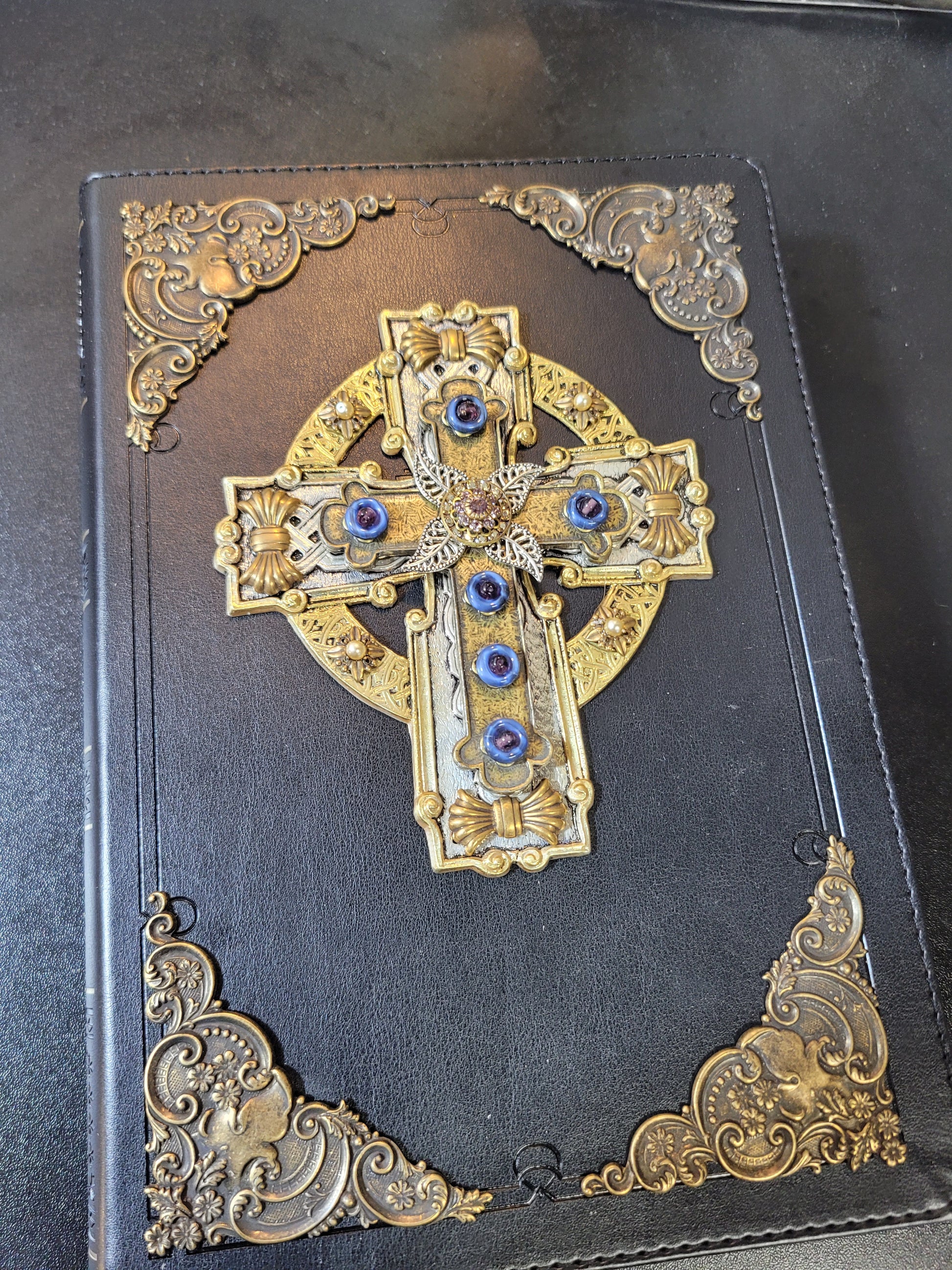 Jo Marz Personal Size jeweled celtic cross bible with ornate gold corners and blue gemstone embellishments