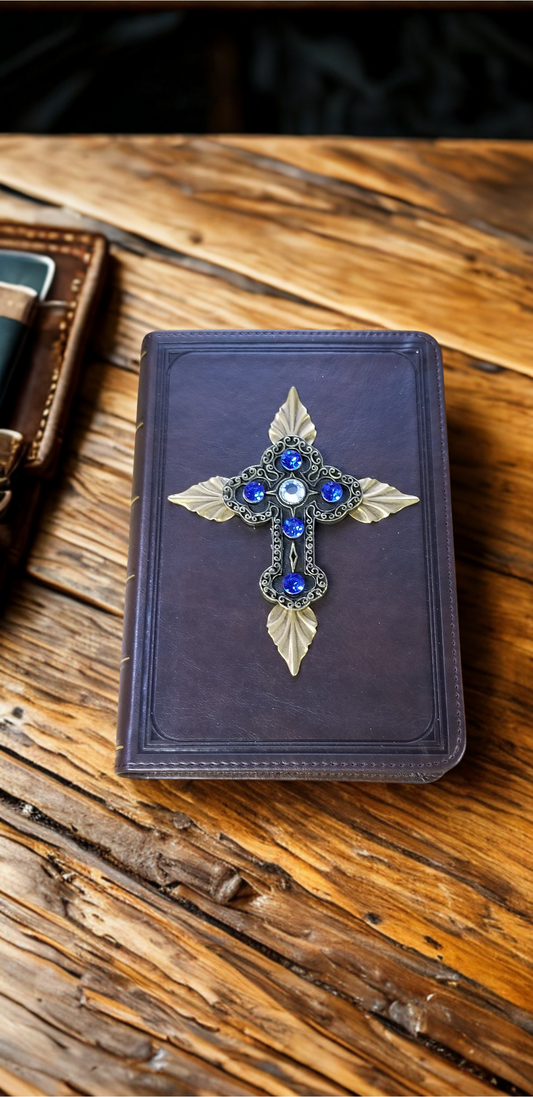 Compact size Jeweled KJV Bible by Dacole Designs with decorative cross and blue gems on leather cover
