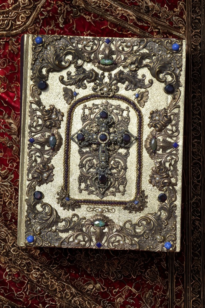 Jo Marz family size jeweled KJV Bible with garnets and pearls featuring ornate gold and blue embellishments