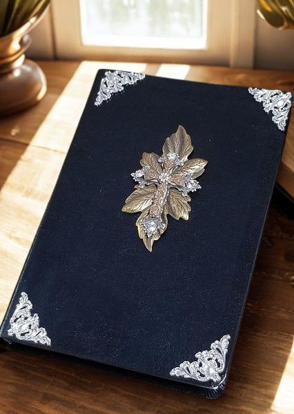 Dacole Designs personal size jeweled NIV Bible with decorative silver corners and leaf cross embellishment