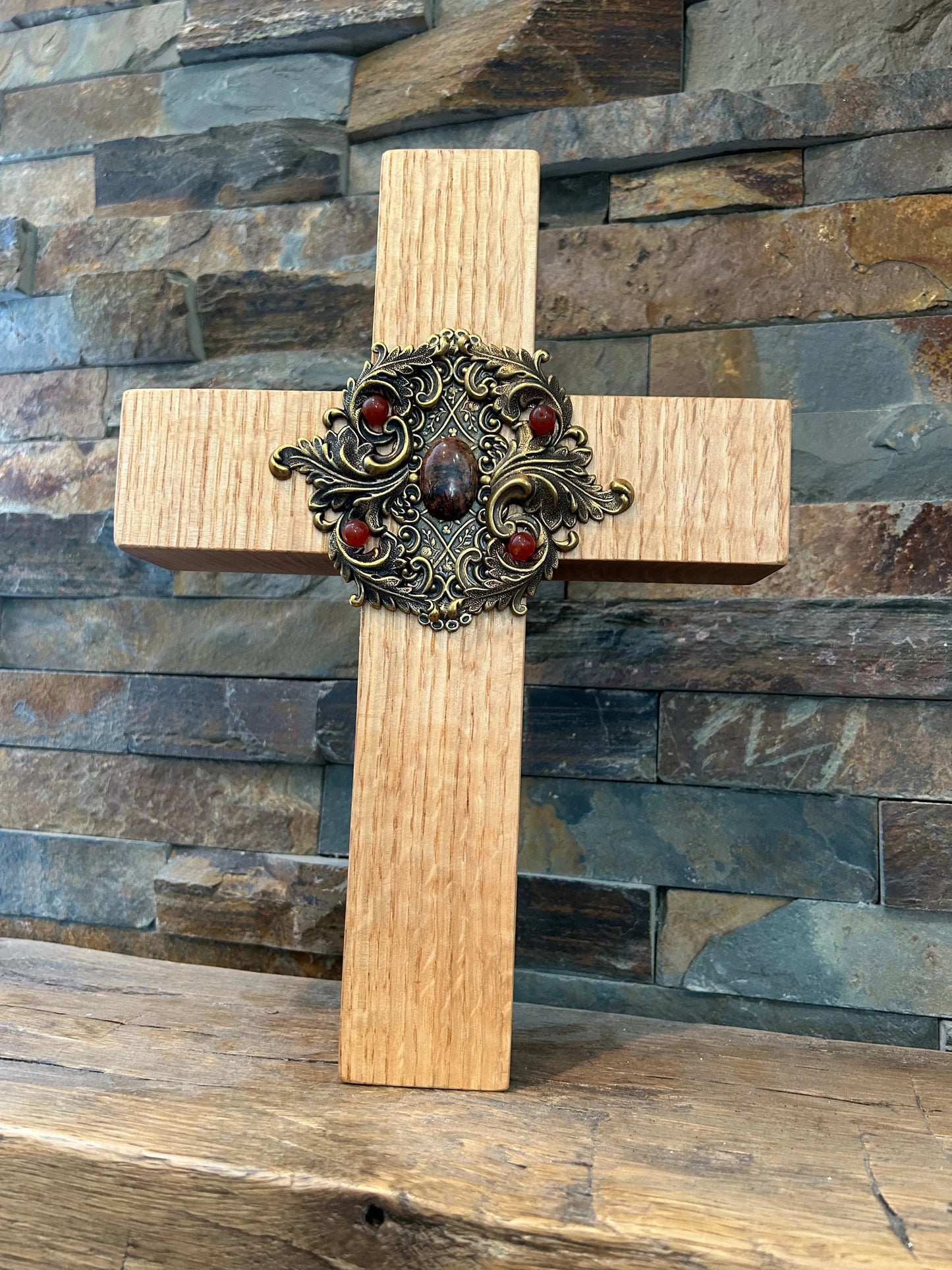 Jeweled oak cross for home decor by Dacole Designs with ornate metal and red stone embellishments