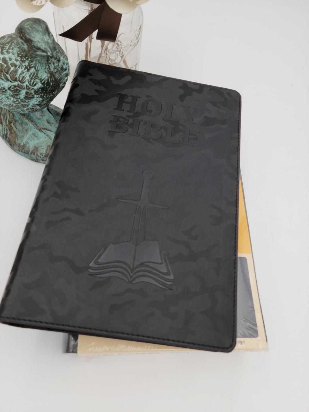 DeMartineau personalized NASB 1995 children's Bible with black cover featuring cross and open book design