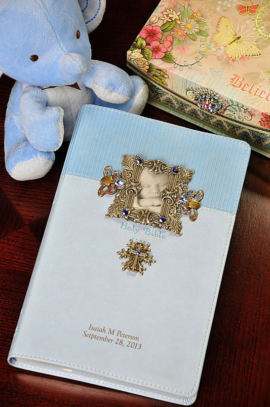Personalized baby boy Bible gift by Dacole Designs with blue and white cover and decorative frame