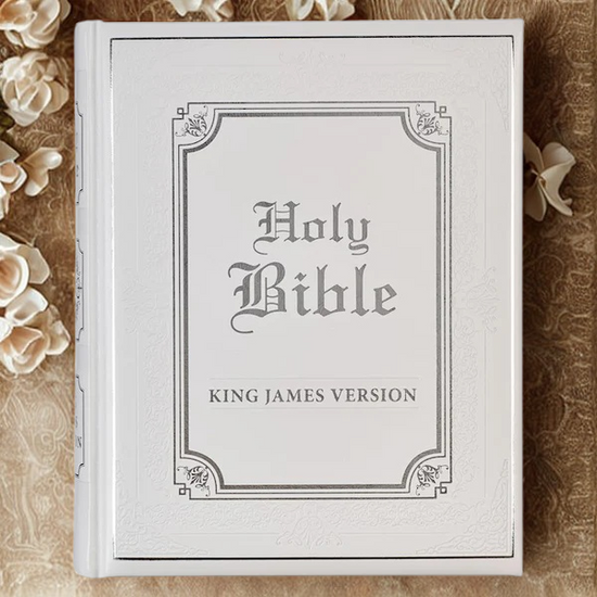 White faux leather King James Bible by DeMartineau with elegant gold embossed cover