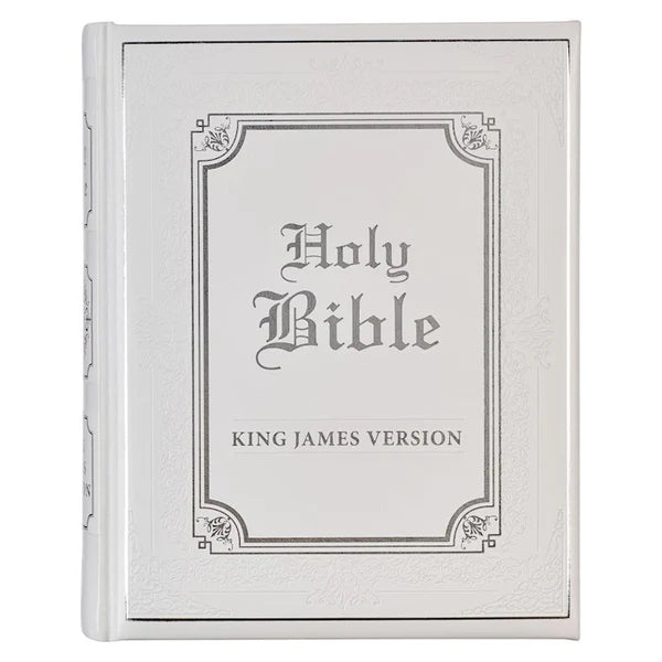 DeMartineau white faux leather King James Bible with embossed cover and classic design