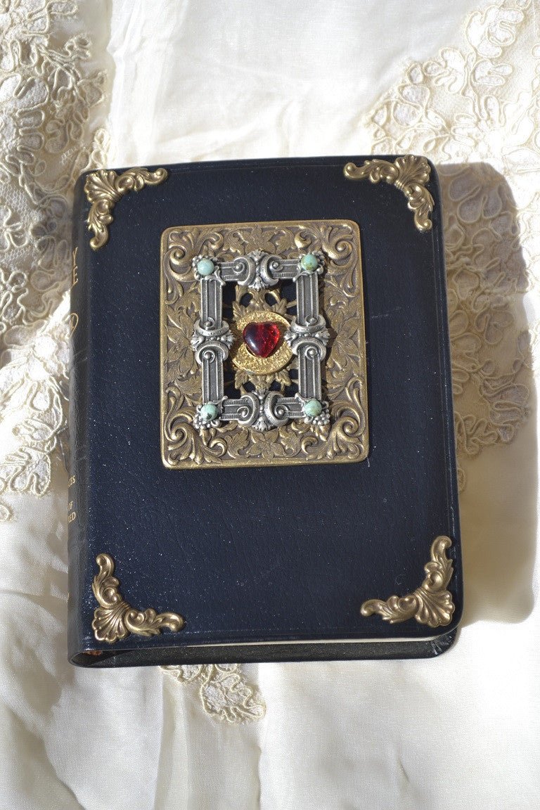 Compact size jeweled Bible for gift giving by Dacole Designs with ornate metal corners and central jeweled decoration
