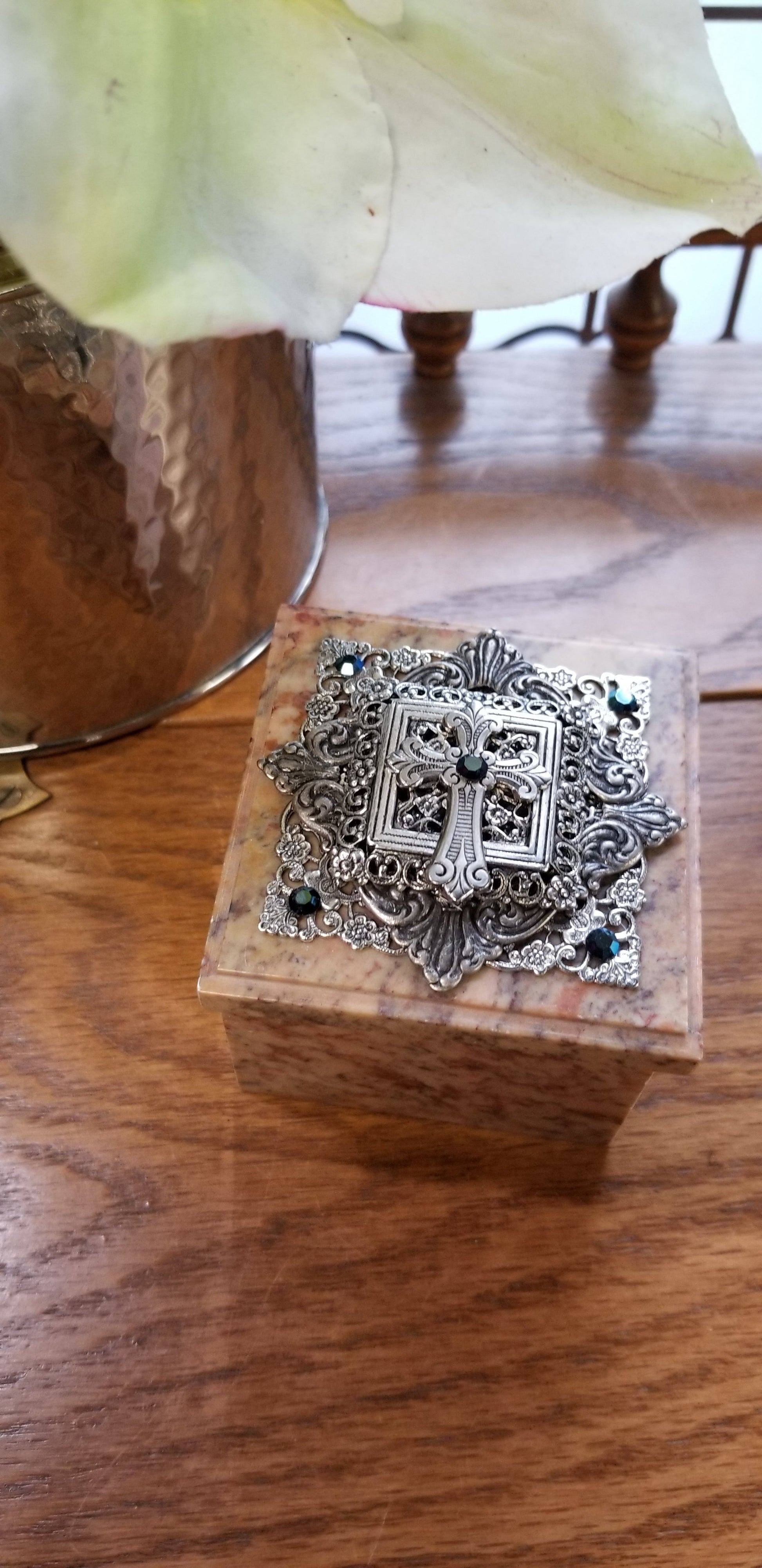 Dacole Designs baptism keepsake box with ornate silver cross and decorative details on wooden surface