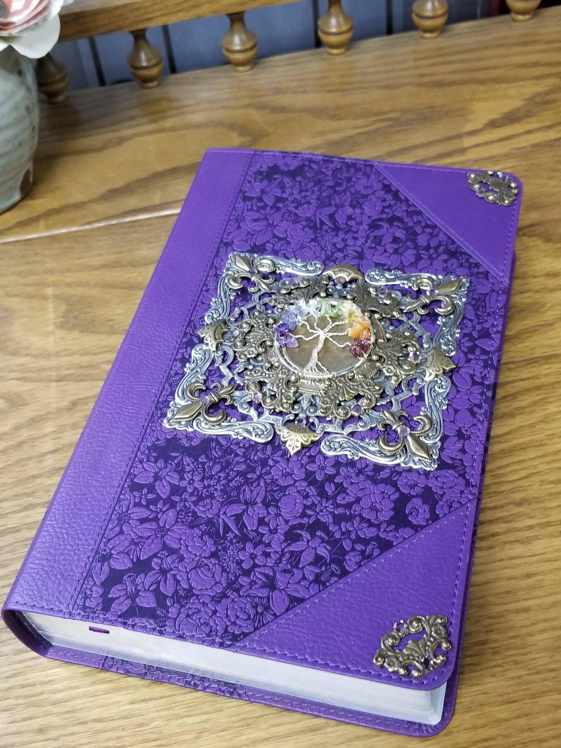 Dacole Designs personal size giant print KJV Bible purple with ornate metal decorative cover on wooden table