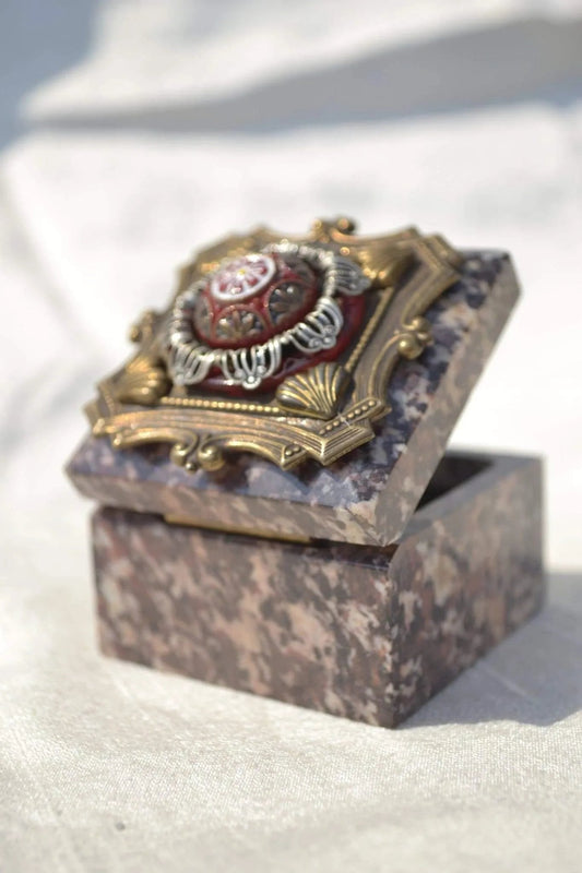 Dacole Designs handcrafted soapstone ring box with ornate decorative lid and purple stone base