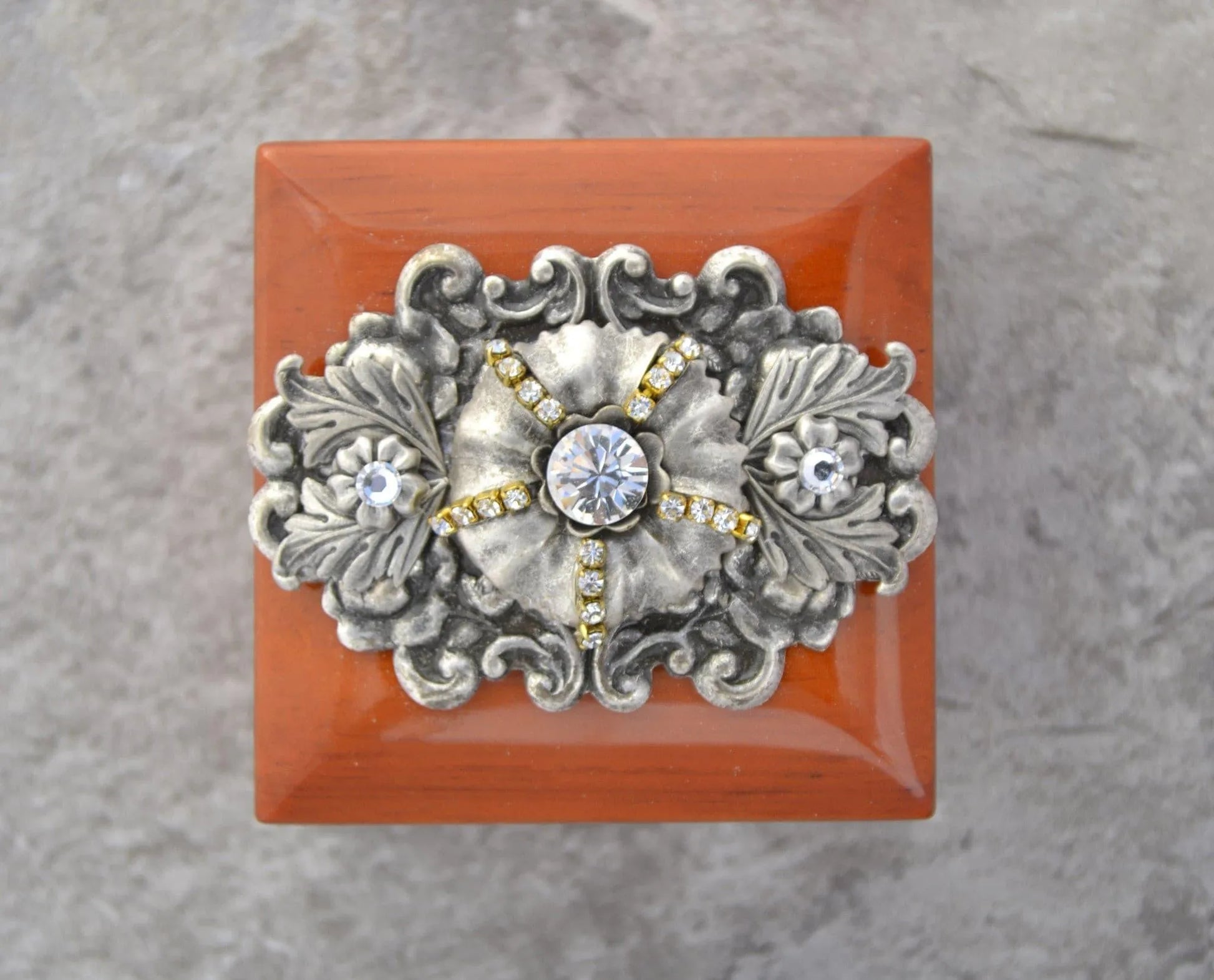 DeMartineau handcrafted wood ring box with ornate silver floral and crystal embellishments on top