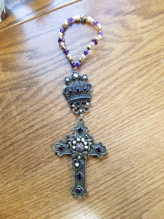 Dacole Designs jeweled cross room blessing gift with purple beads and decorative crown on wood background