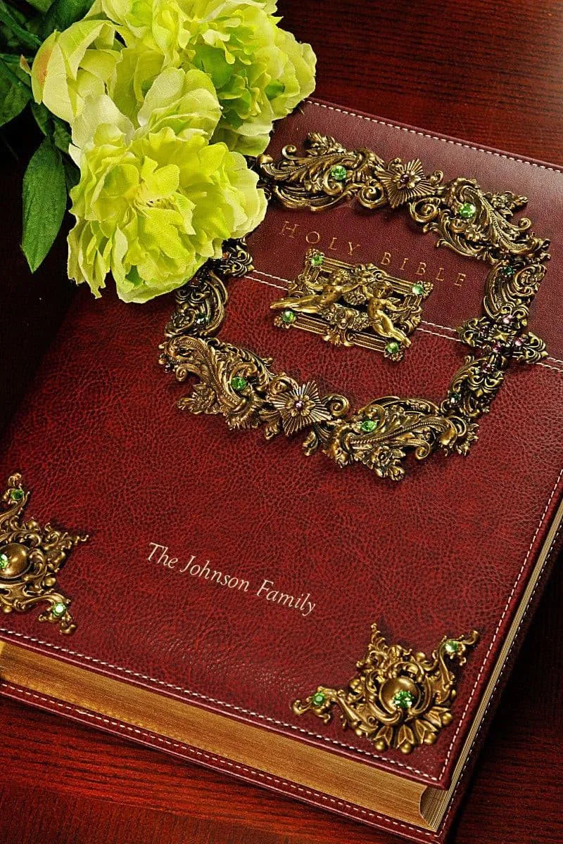 Dacole Designs jeweled family bible with ornate gold and green embellishments and personalized family name on brown cover