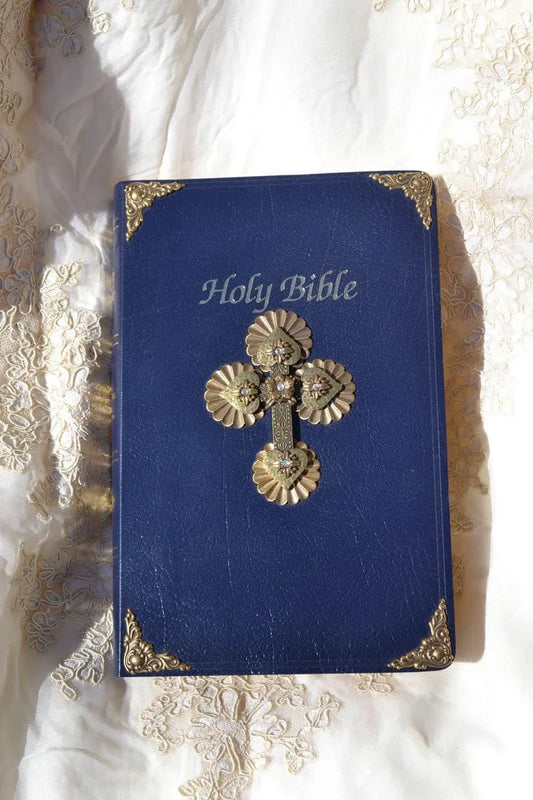 Dacole Designs jeweled first communion bible with navy blue cover and gold decorative cross