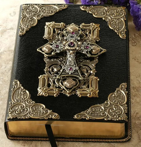 Jo Marz family size jeweled KJV Bible with amethyst on black leather cover with ornate metal corner decorations