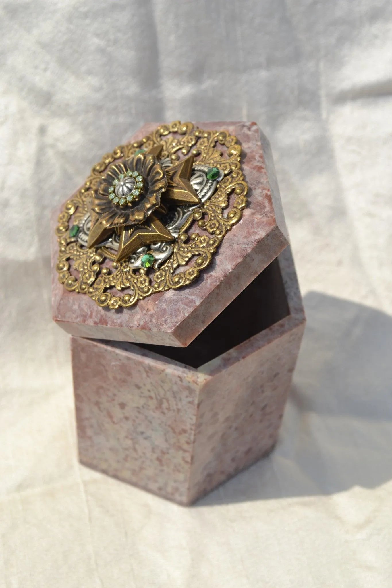 Jo Marz jeweled Maltese cross keepsake box with ornate gold and gem decoration on pink stone