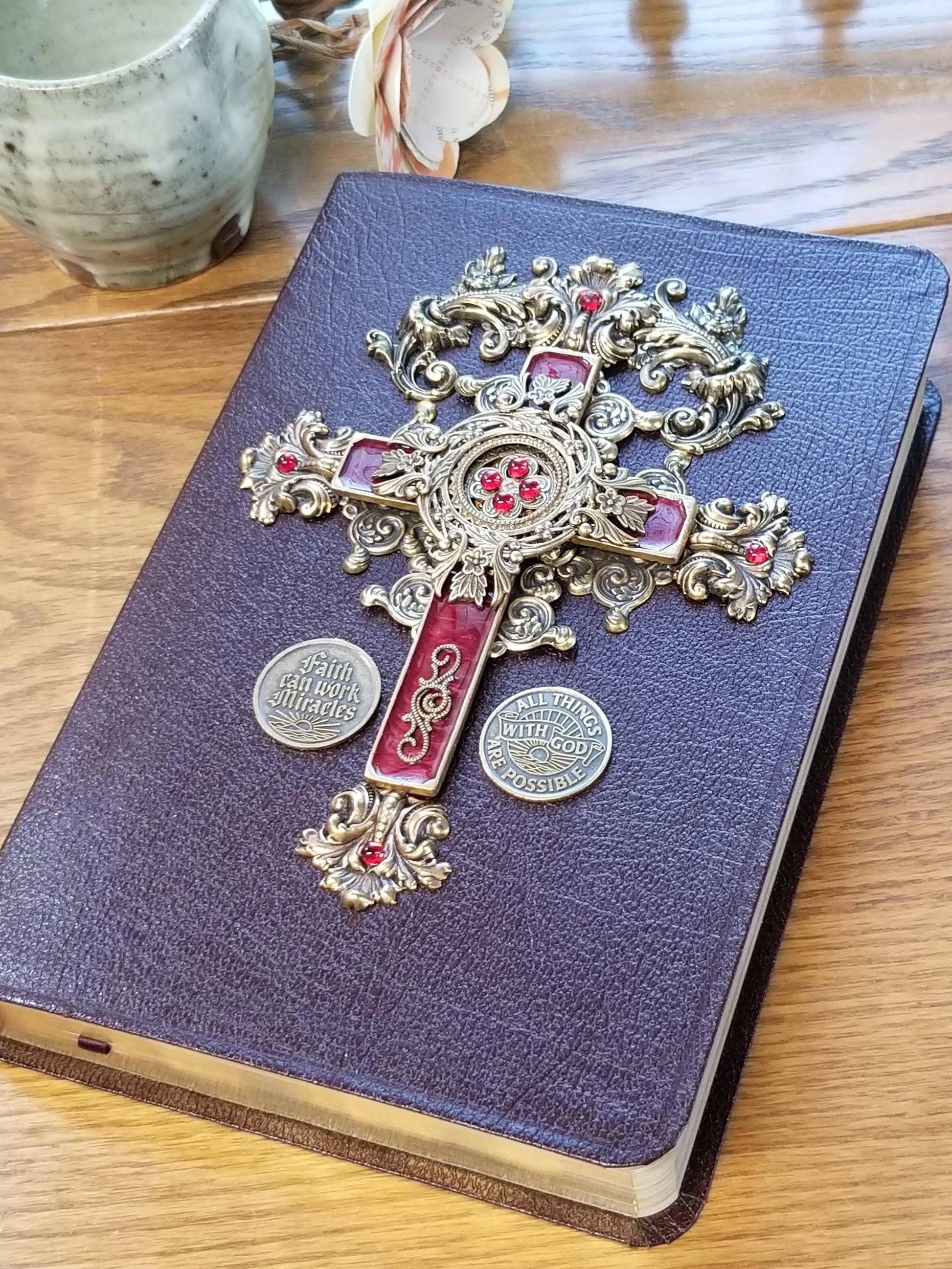 Dacole Designs jeweled NIV Bible personal size with ornate gold and red jeweled cross on brown cover