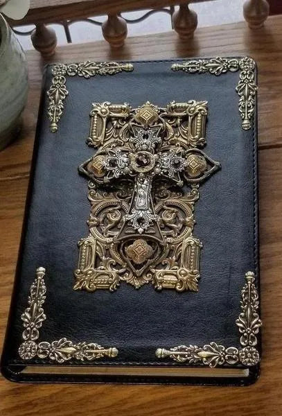 Jo Marz personal size jeweled NKJV Bible with amethyst crystals featuring ornate metal cross on black cover