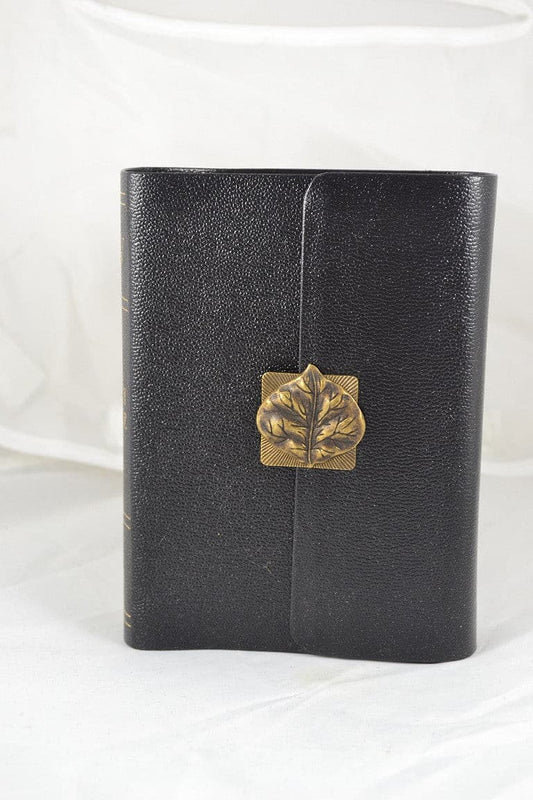 DeMartineau compact size large print jeweled KJV Bible with black leather cover and gold leaf clasp